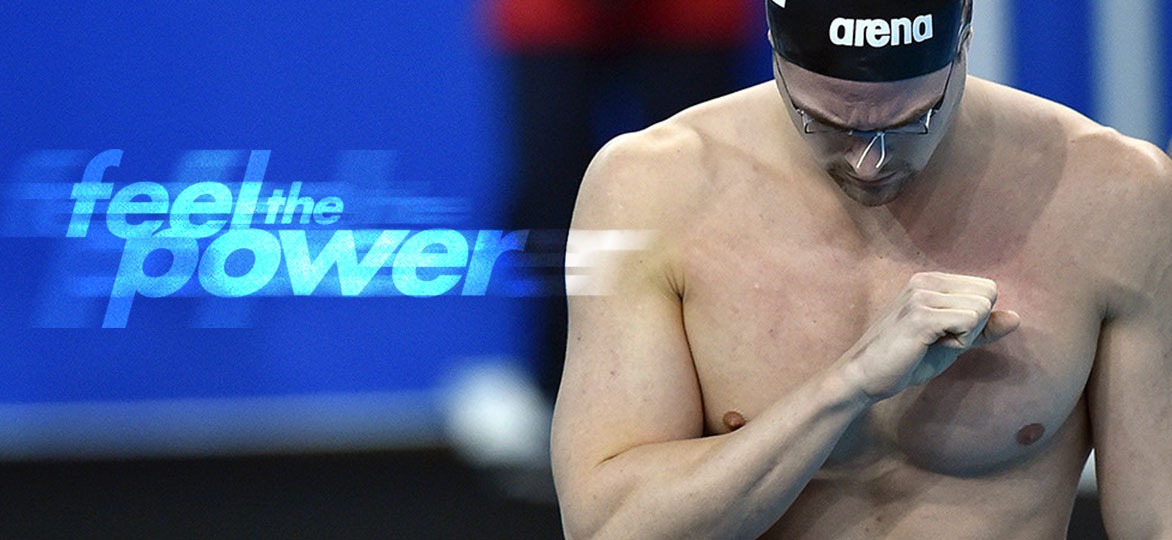Feel the Power.  Swimmer  with hand on chest